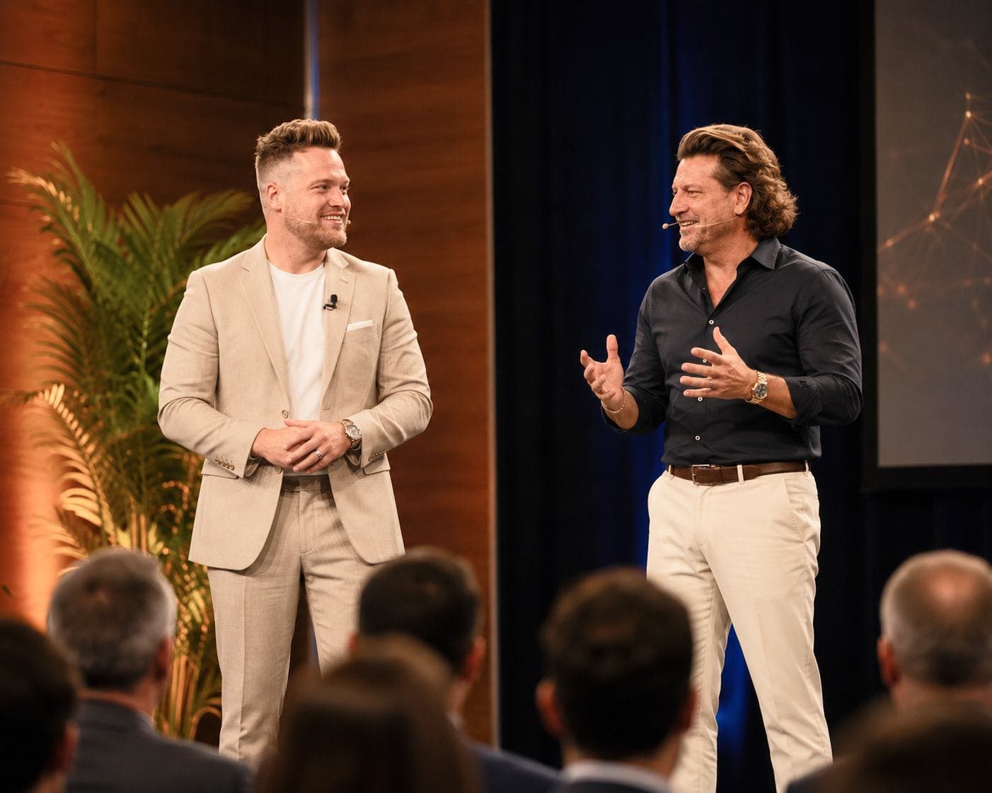 Chad Wittfeldt and Niko Mercuris presenting on stage